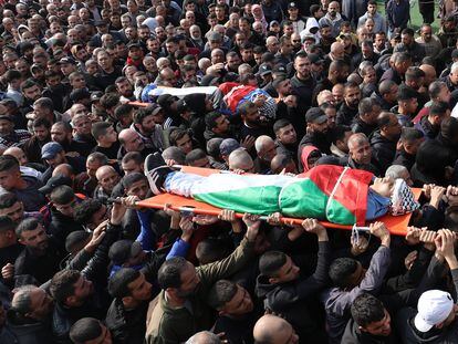 The funeral for six young Palestinians, killed after an attack in the Nur Shams refugee camp, on December 27.