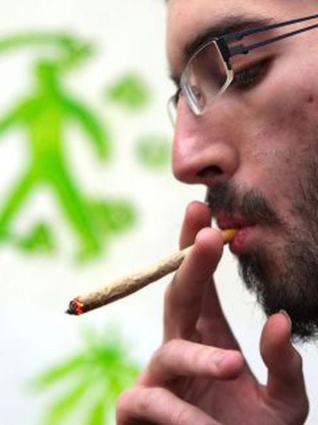 A man smoking cannabis at a Barcelona club.
