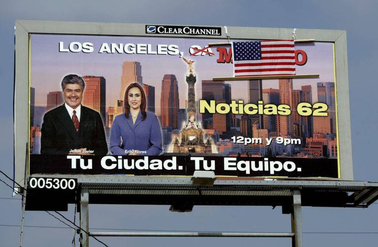 An American flag has been placed over the word “Mexico” on this billboard in the US.