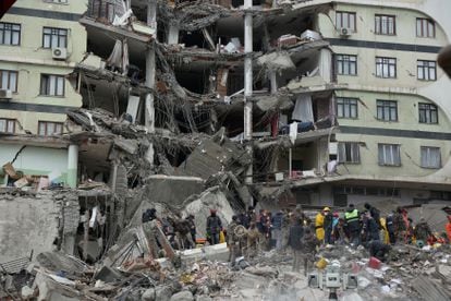 Rescue workers search for survivors under the rubble following an earthquake in Diyarbakir, Turkey.