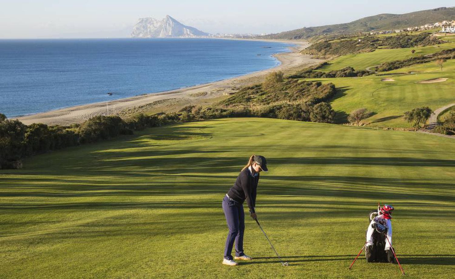 The Alcaidesa Links golf course in Cádiz with views of Alcaidesa beach and Gibraltar in the distance. 