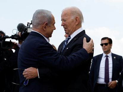 U.S. President Joe Biden greets Israeli Prime Minister Benjamin Netanyahu on October 18.