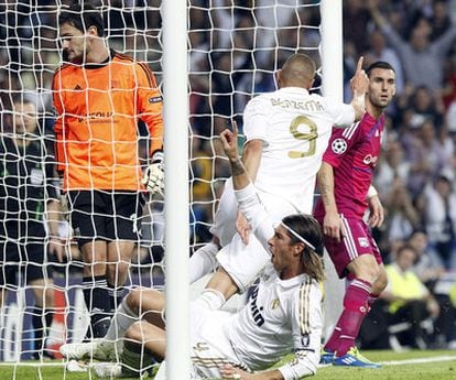 Benzema wheels away after opening the scoring for Real against Lyon.