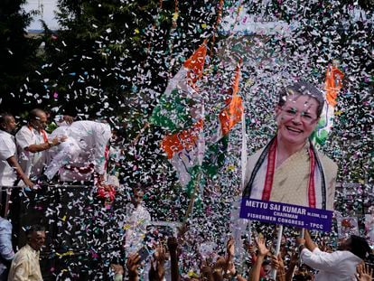 Supporters of India's main opposition party display a cutout photo of their leader Sonia Gandhi, as they celebrate early leads for their party in Telangana state elections in Hyderabad, India, on Dec.3, 2023.