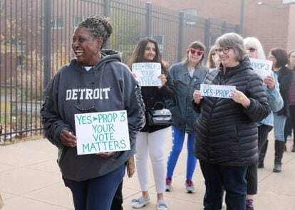 Pro-abortion activists wait to enter Barack Obama's rally in Detroit last Saturday.