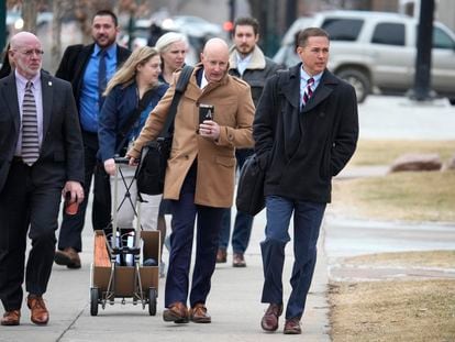 Michael J. Allen, front right, district attorney for Colorado's Fourth Judicial District, leads a contingent of lawyers into the El Paso County courthouse for a preliminary hearing for the alleged shooter in the Club Q mass shooting Wednesday, Feb. 22, 2023, in Colorado Springs, Colo.