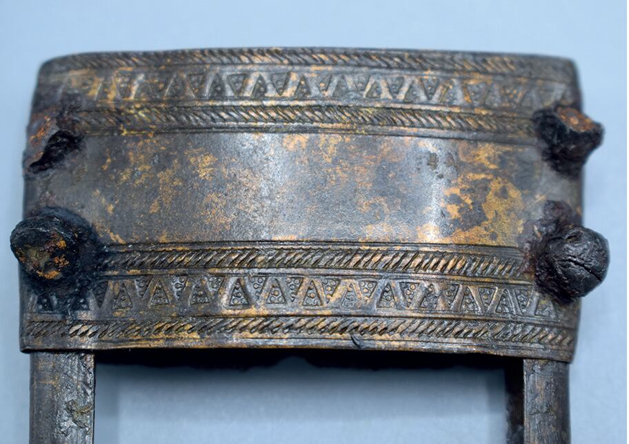 Copper mounting plate at the top of the Vaccaei dagger scabbard, from the Marsal Collection.