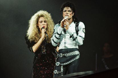 Sheryl Crow and Michael Jackson on stage at a concert in London in 1988.