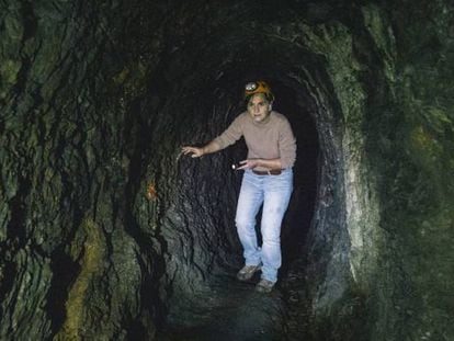 Mertxe Urteaga inside a tunnel made by the Romans under Peñas de Aya in Spain's Basque Country.