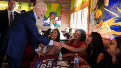 U.S. President Joe Biden greets his supporters during a campaign event at a Mexican restaurant in the Phoenix area, Arizona, U.S., March 19, 2024.