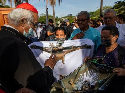 Cardinal Leopoldo Brenes blesses images of Christ during a congregation for Good Friday, in Managua, April 7.