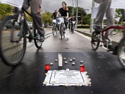Members of the Catalonia Bicycle Club mourn the loss of a bike lane.