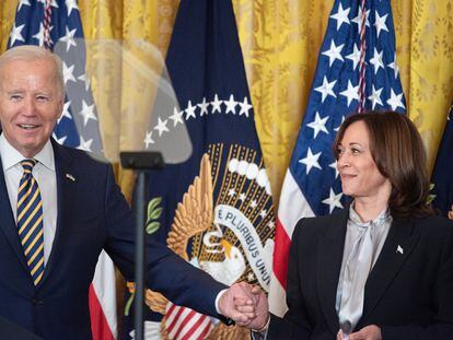 US President Joe Biden holds US Vice President Kamala Harris' hand as he recognizes her in his remarks at the Black History Month Reception at the White House in Washington, D.C., February 06, 2024.