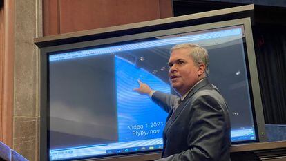 Scott Bray, Deputy Director of Naval Intelligence, pointing at a flying object during the hearing.