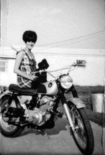Karen Silkwood photographed on a motorcycle.