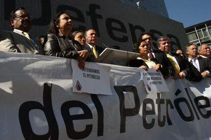 PRD officials and supporters hold a protest Tuesday in Mexico City against the government&rsquo;s proposed energy reform.