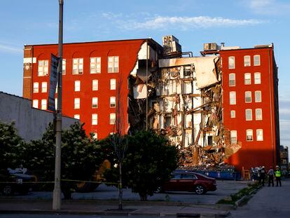 Emergency crews work the scene of a partial apartment building collapse Sunday, May 28, 2023, in Davenport, Iowa. (Nikos Frazier/Quad City Times via AP)