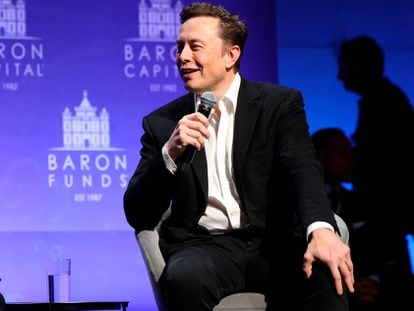 Elon Musk answers questions from businessman Ron Baron at his annual conference in New York on November 4.