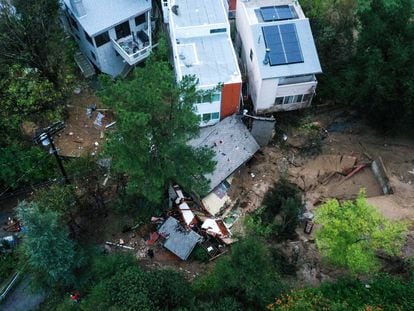 An aerial view of the remains of a home destroyed by a mudslide caused by an ongoing rain storm in Los Angeles, California, February 5, 2024.