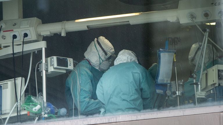 Health personnel working at an Intensive Care Unit at La Paz Hospital in Madrid.