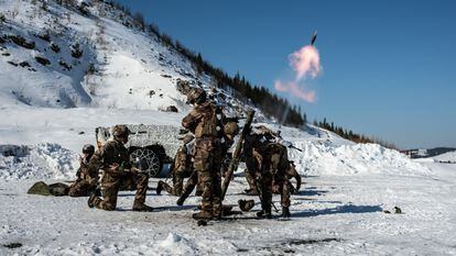 French soldiers fire mortars near Rena, Norway during NATO's Exercise Brilliant Jump 2022, aimed at training the very high-readiness component of the NATO Response Force. 