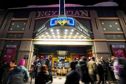 Pedestrians walk down Main Street in front of the Egyptian Theatre during the 2023 Sundance Film Festival on Saturday, Jan. 21, 2023, in Park City, Utah.