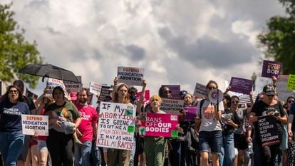 Protesters march past the U.S. Capitol following a Planned Parenthood rally in support of abortion access outside the Supreme Court on Saturday, April. 15, 2023, in Washington.
