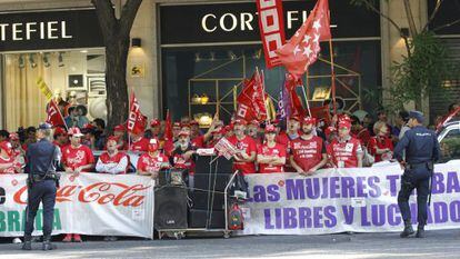 Coca-Cola workers protest against the layoffs.