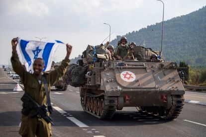 Israeli armored carriers head to the border with Lebanon on Tuesday, Oct. 10, 2023. 