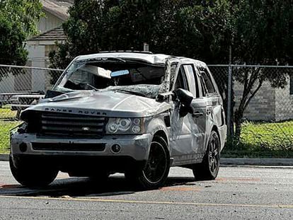 A damaged vehicle sits at the site of a deadly collision near a bus stop in Brownsville, Texas, on May 7, 2023.