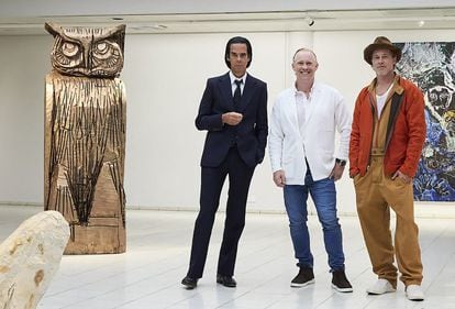 From left to right, Australian singer Nick Cave, British sculptor Thomas Houseago and American actor Brad Pitt present a joint exhibition at The Sara Hilden Art Museum in Tampere, Finland, on September 19, 2022.