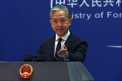 In this image made from video, Chinese Foreign Ministry spokesperson Wang Wenbin gestures as he speaks during a media briefing at the Ministry of Foreign Affairs office in Beijing, Monday, Feb. 13, 2023.