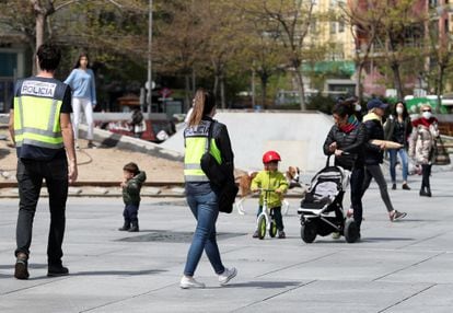 Police on patrol in Madrid on Monday, the second day that children were allowed out onto the street.