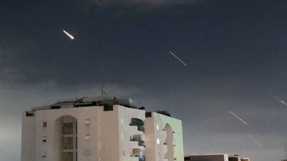 The Israeli Iron Dome air defense system launches projectiles to intercept missiles fired from Iran, in central Israel, on April 14.