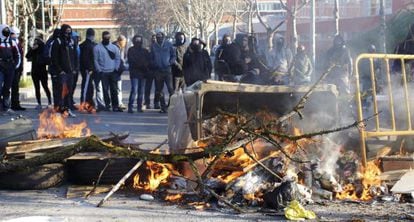 A burning barricade at Madrid's Complutense University.