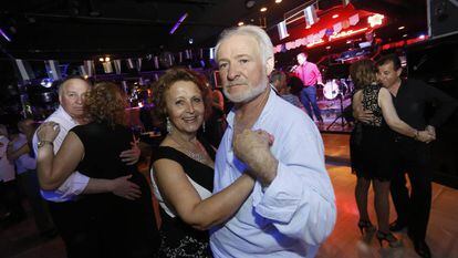 Senior citizens dancing the evening away at Madrid's La Rosa ballroom.