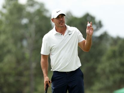 Brooks Koepka of the United States reacts on the 18th green during the second round of the 2023 Masters Tournament at Augusta National Golf Club on April 07, 2023 in Augusta, Georgia.