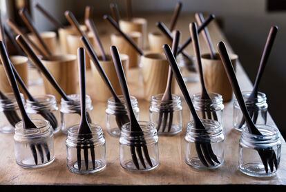 Walnut forks drying after varnish has been applied. 