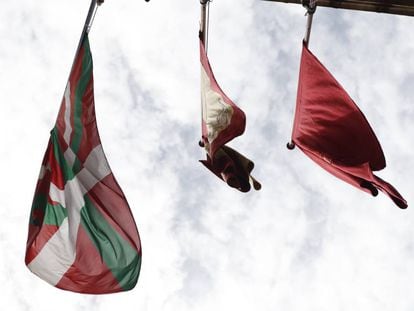 The Basque flag (left) flys outside Pamplona City Hall on Thursday.