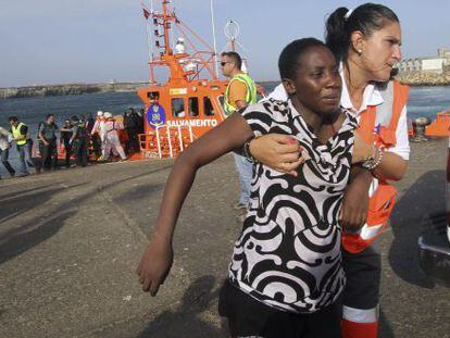 A would-be immigrant is helped ashore at the port of Tarifa, southern Spain, this week.