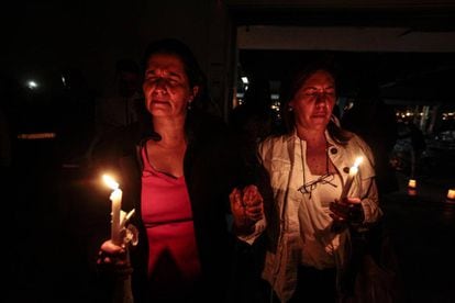 Women hold a vigil in memory of the victims of the April 16 earthquake.
