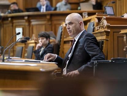Swiss Federal President Alain Berset, front, attends an extraordinary session of the Federal Assembly in Bern, Switzerland, on April 11, 2023.