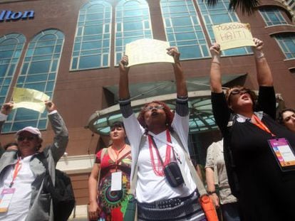 Several women protest last month over the court&#039;s decision outside a Santo Domingo hotel where a regional women&#039;s conference took place. 