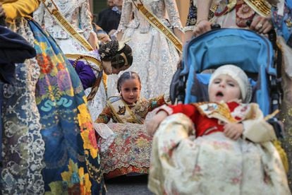 Entire families, including children and babies, dress in elaborate costumes as part of the Fallas tradition.