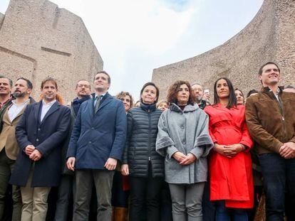 Abascal (3rd from left), Casado (c) and Rivera (r) pose for a photo after the demonstration.