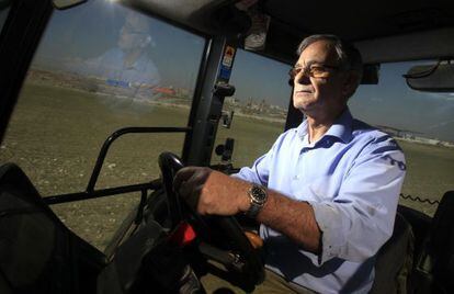Miguel Serrano in his tractor. 
