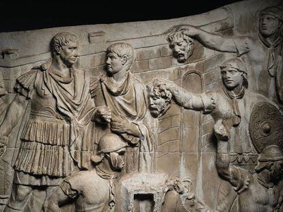 Roman Auxiliaries present the decapitated heads of barbarians to the emperor.
