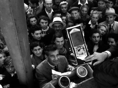 Leonard Bernstein (below, at center), during a meet-and-greet in Moscow, August 1959.