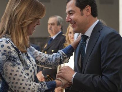 Susana Díaz with Juan Manuel Moreno Bonilla, the PP's leader in Andalusia, last July.