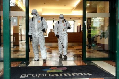 Members of the Emergency Military Unit (UME) disinfecting a care home in Madrid in March 2020.